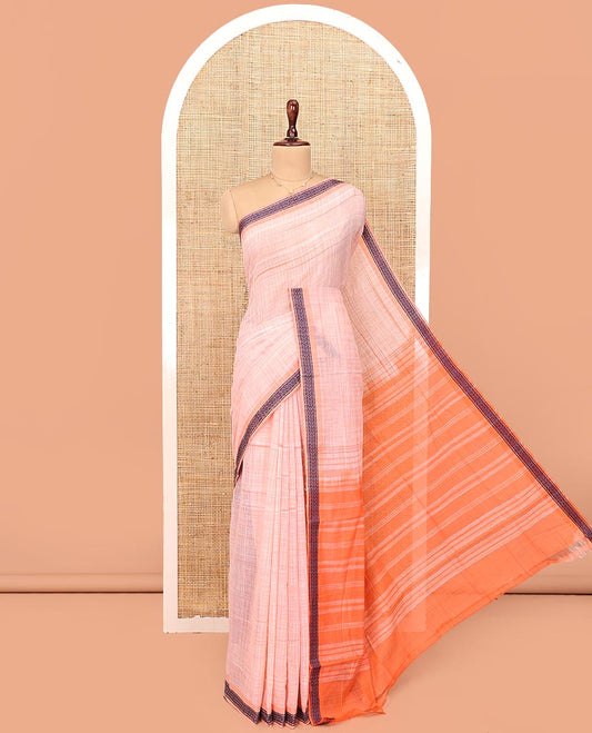 Pale Peach Andhra Cotton Saree, Sparsely Textured Heathered Patterns All Over Its Body, Complemented by Contrast Traditional Border, Pallu Steeped with Stripes, and Paired with a Matching Blouse