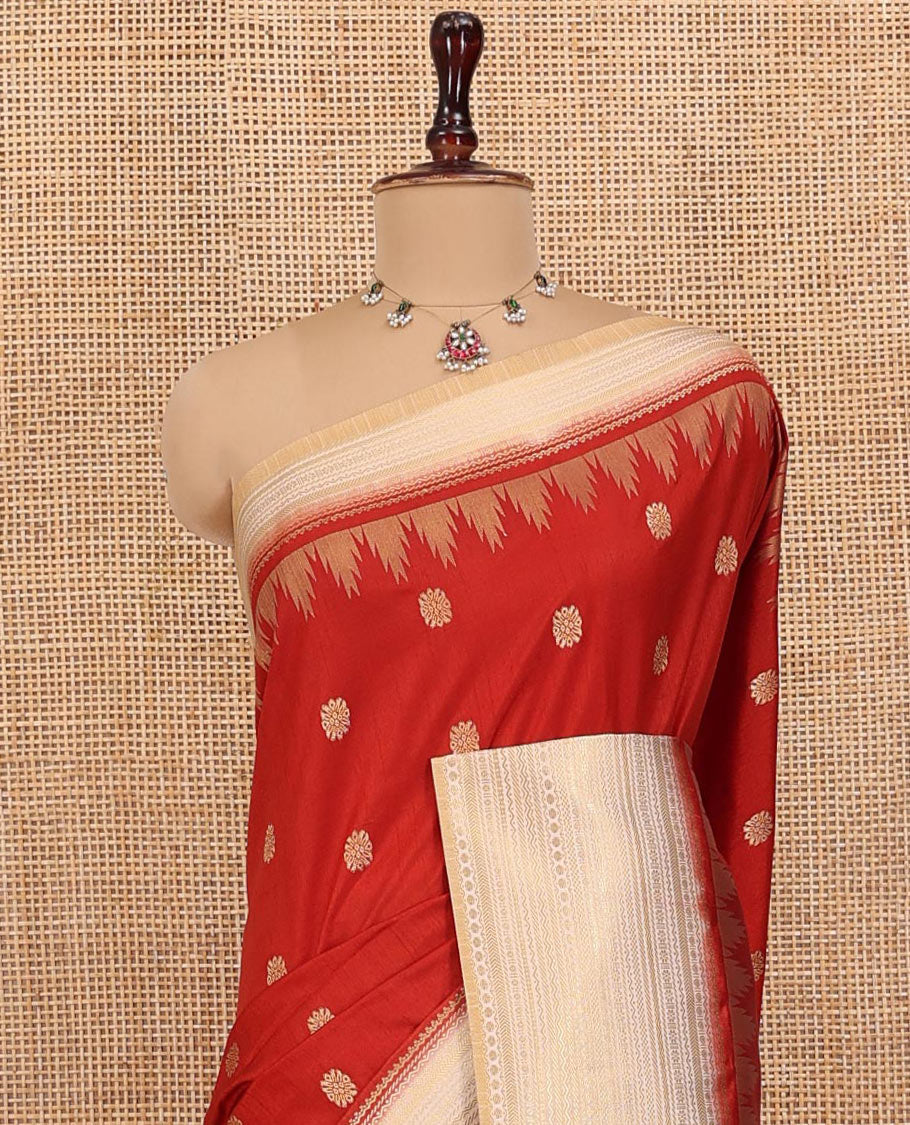 Rust Dupion Silk Saree, Decked Up with Zari Buttas All Over Its Body, Complemented by a Contrast Temple Traditional Zari Design Woven Border, Traditional Pallu of Temple Designs, and Paired with a Contrast Blouse