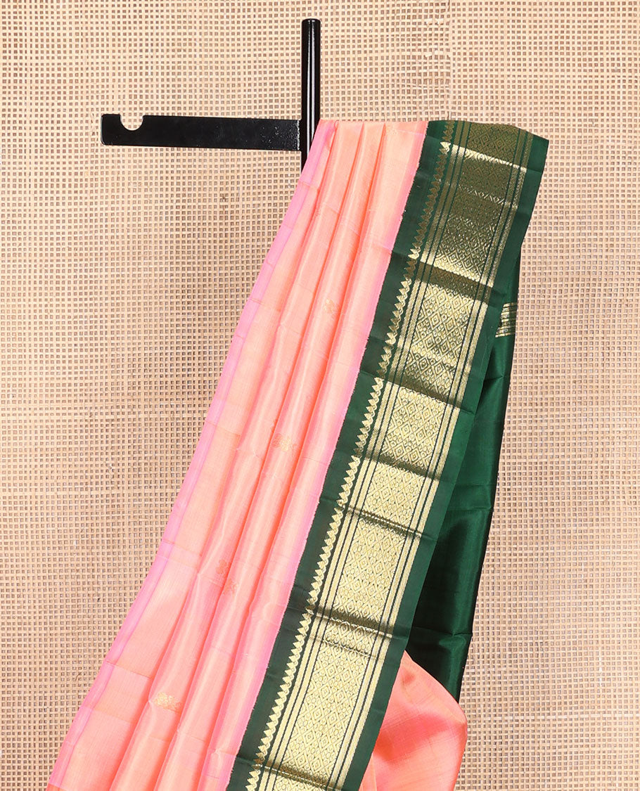 Pink zari buttas Kanchipuram silk saree, contrast one-sided korvai border of salangai, banaras, and jaal designs, and zari design pallu