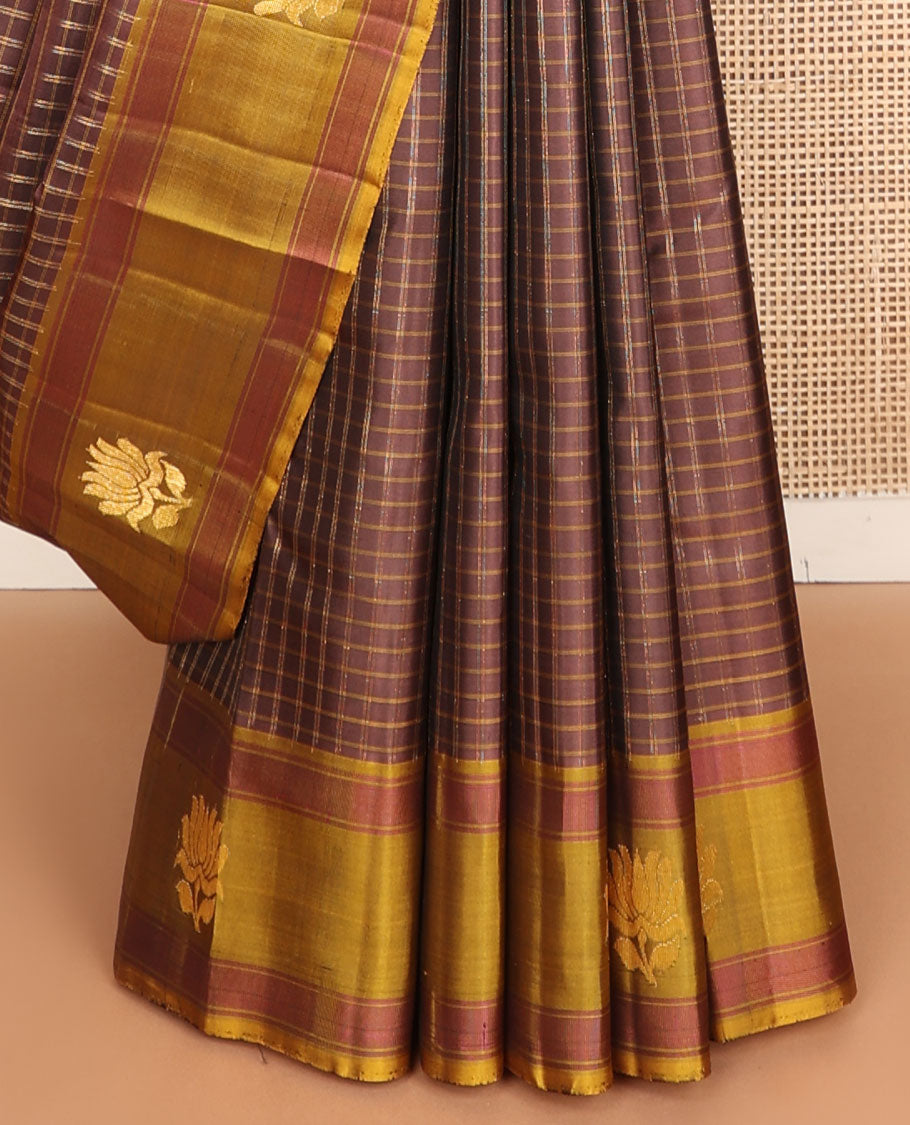 Brown checked Kanchipuram silksaree, contrast lotus design border & pallu of zari stripes