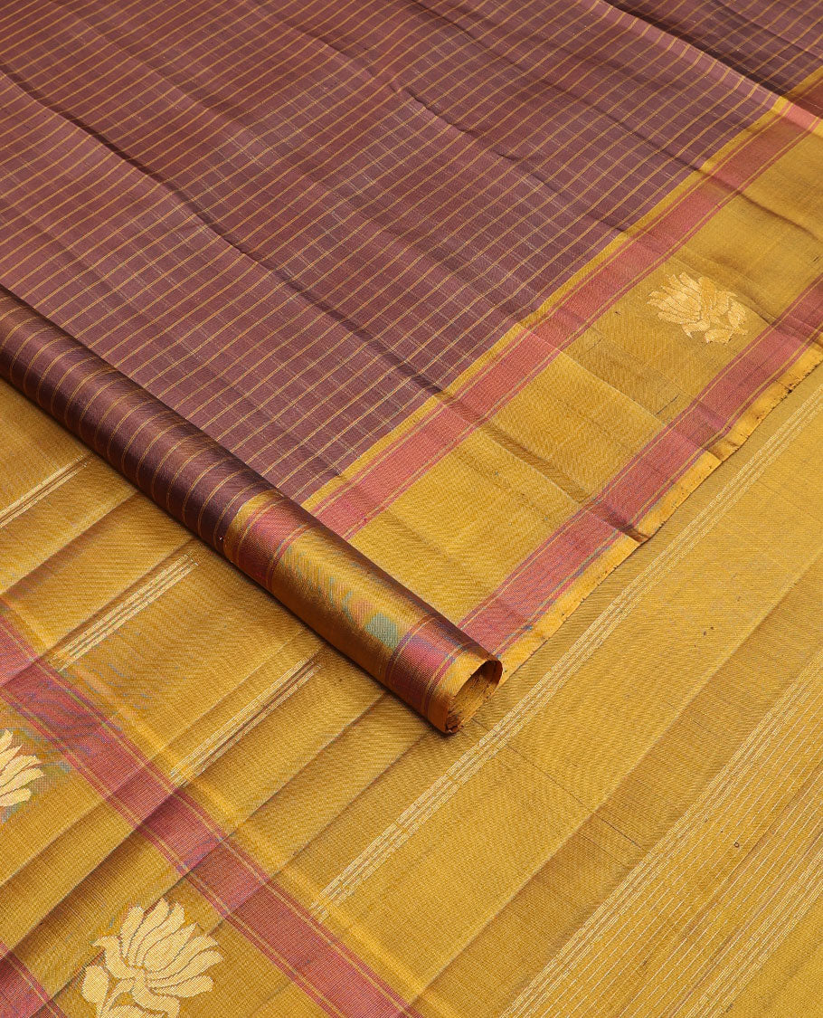 Brown checked Kanchipuram silksaree, contrast lotus design border & pallu of zari stripes