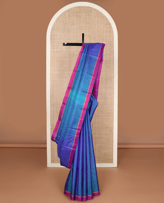 Blue plain design Kanchipuram silk saree, contrast zari striped border & zari striped pallu