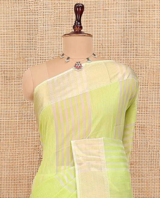 Green Maheshwari Cotton Saree, Subtly Sparkled with Stripes, Highlighted by a Zari Border, Gleaming Zari Pallu, and Paired with a Matching Blouse