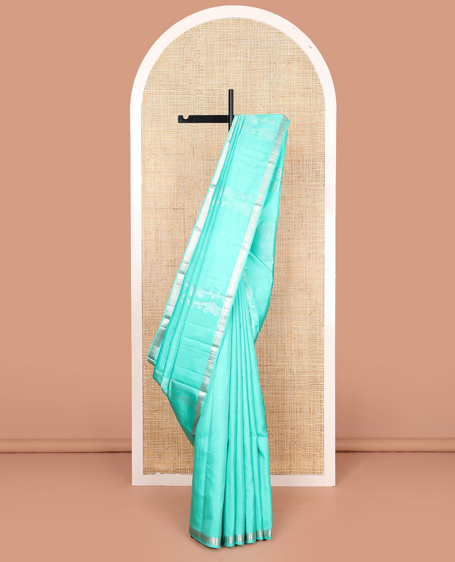 Turquoise zari design soft silk saree, zari border of kathir designs, and zari-rich pallu