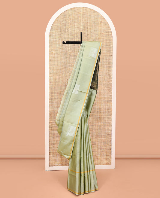 Green Mayuri Lite Silk Mix Saree, Sparsely Woven with Checks on Its Body, Highlighted by Self-Border, Complemented by a Contrast Pallu of Floral Designs, and Paired with a Contrast Blouse