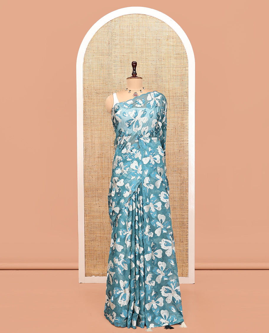 Blue Organza Saree, Impeccably Styled with Floral motifs Thread Embroidery, Scallop-Embroidered Border, and a Matching  b Blouse