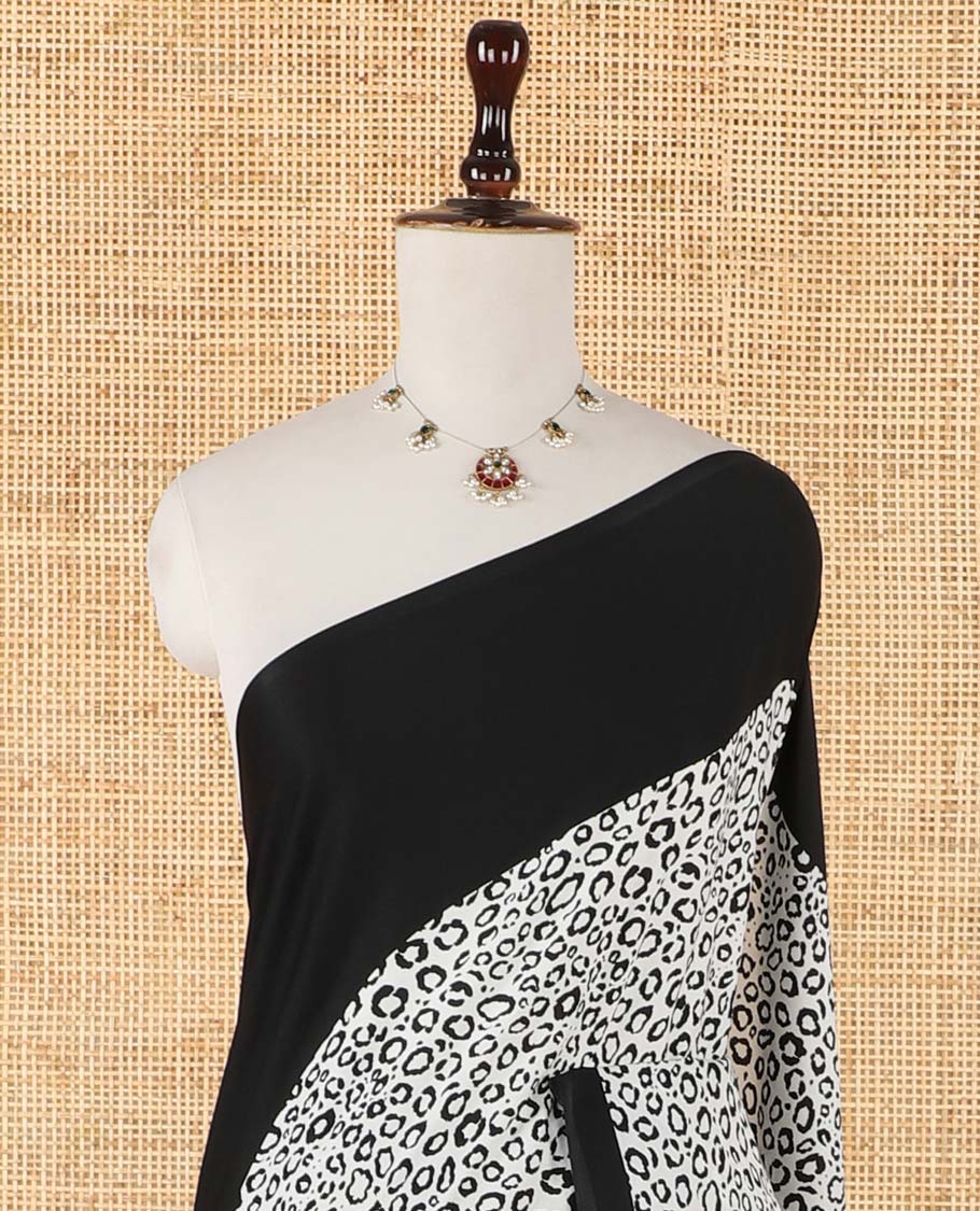 White leopard-skin-style animal printed crepe saree with contrast black plain border