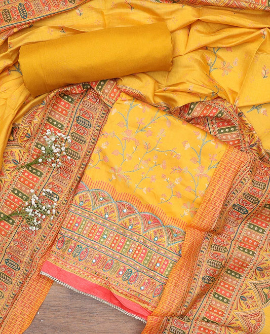 Yellow material churidar set, floral and kaleidoscopic geometric patterned rayon top, plain bottom, and dupatta of floral and geometric patterns
