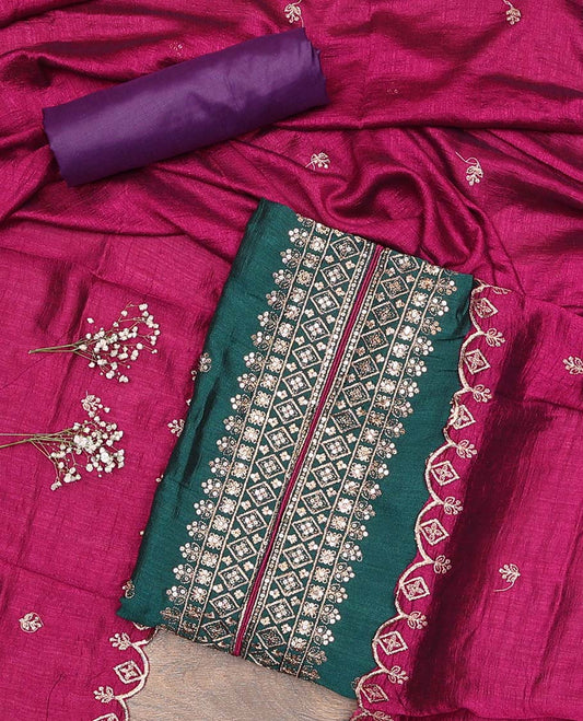 Green material chudidar set, sequins and thread embroidered top, contrast plain bottom, and scallop embroidered dupatta