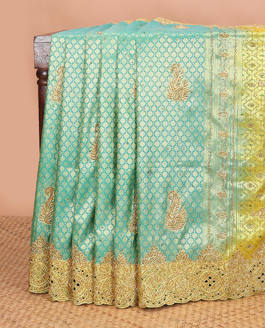 Green jacquard stone embroidered silk saree, contrast stone embroidered scallop zari cut work border & zari woven stone embroidery pallu