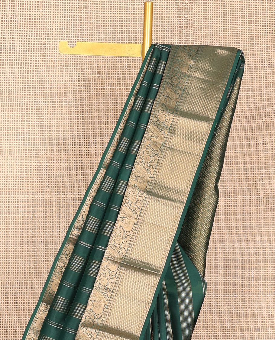 Green zari design silk saree, zari border of thilakam mokku,kodi visiry,mayil & then kuli kann & jaal pallu