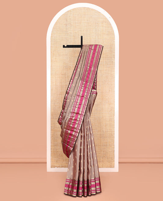 Grey Vasundhara Lite Silk Mix Saree, Subtly Woven with Zari Buttas All Over Its Body, Complemented by Contrast Border of Kodi Visiry Designs, Pallu Steeped with Chakram Designs, and Paired with a Contrast Blouse