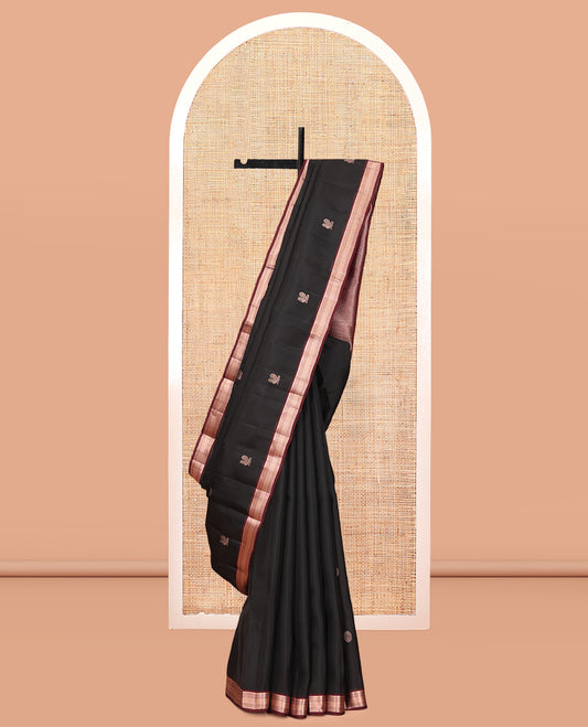 Black Vasundhara Lite Silk Mix Saree, Mesmerized with Mayil Buttas, a Contrast Border of Thilakam Mokku, Muthu, Lavangam, and Neli Designs, Jaal Pallu, and a Contrast Blouse