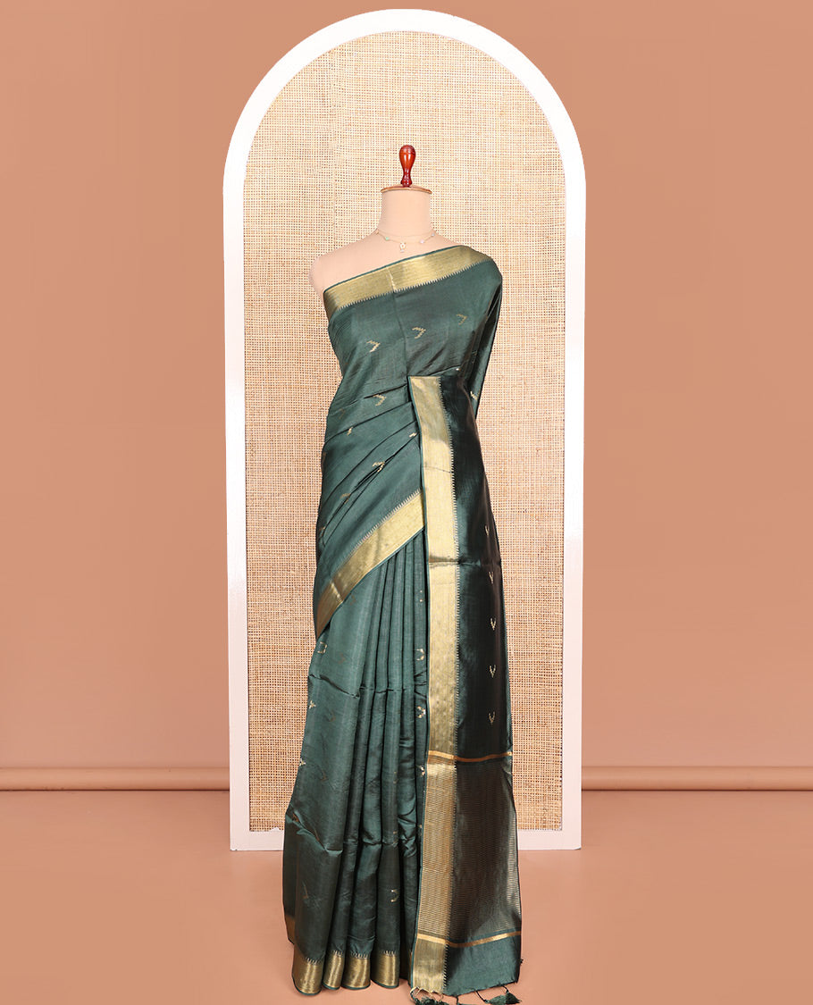 Green Banana Pith Saree Decorated with Zari Temple Buttas, Delicately Woven Temple Zari Border, Gleaming Zari Pallu of Horizontal Stripes in Zari, and Paired with a Matching Plain Blouse