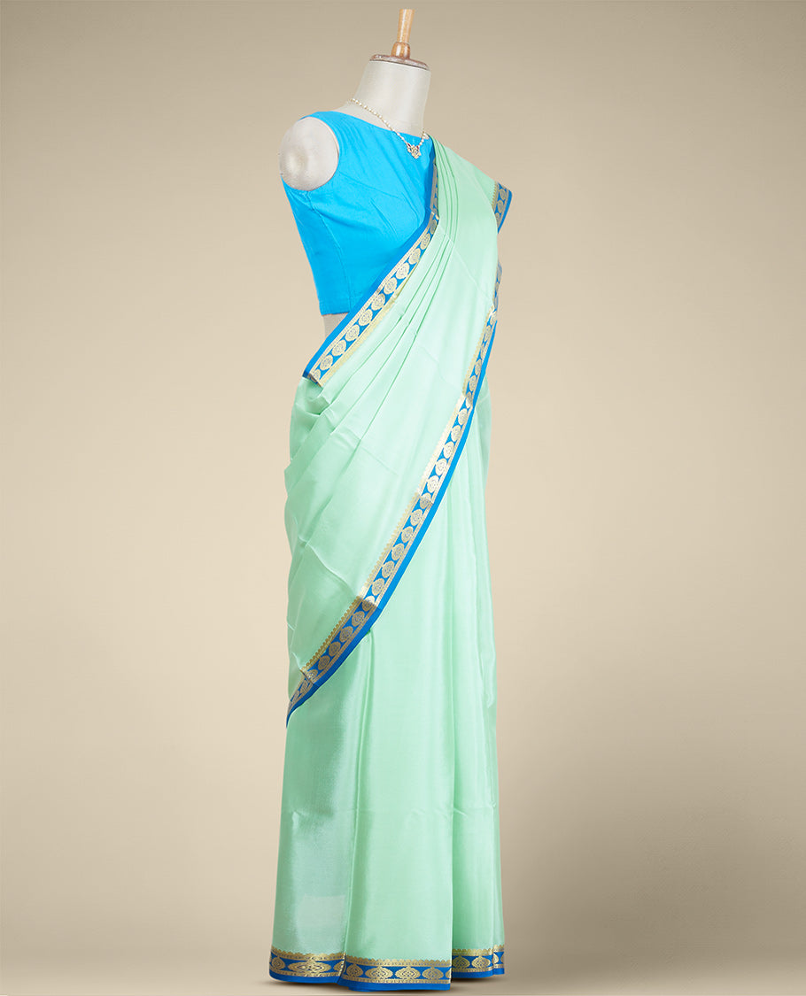 Green mysore silk saree with contrast floral design border