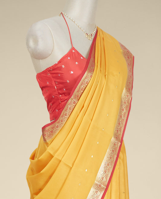 Yellow buttas mysore silk saree with contrast floral zari design border