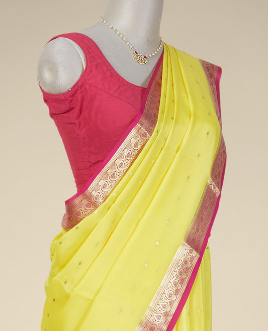 Yellow buttas mysore silk saree with contrast floral design border