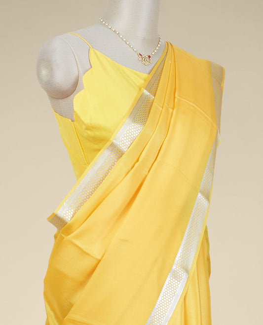Yellow mysore silk saree with contrast floral zari design border