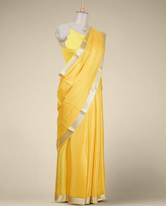 Yellow mysore silk saree with contrast floral zari design border