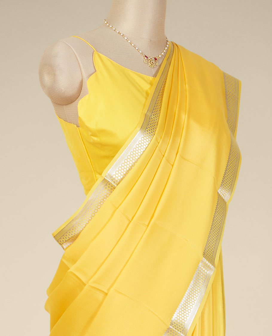 Yellow mysore silk saree with self checked zari design border