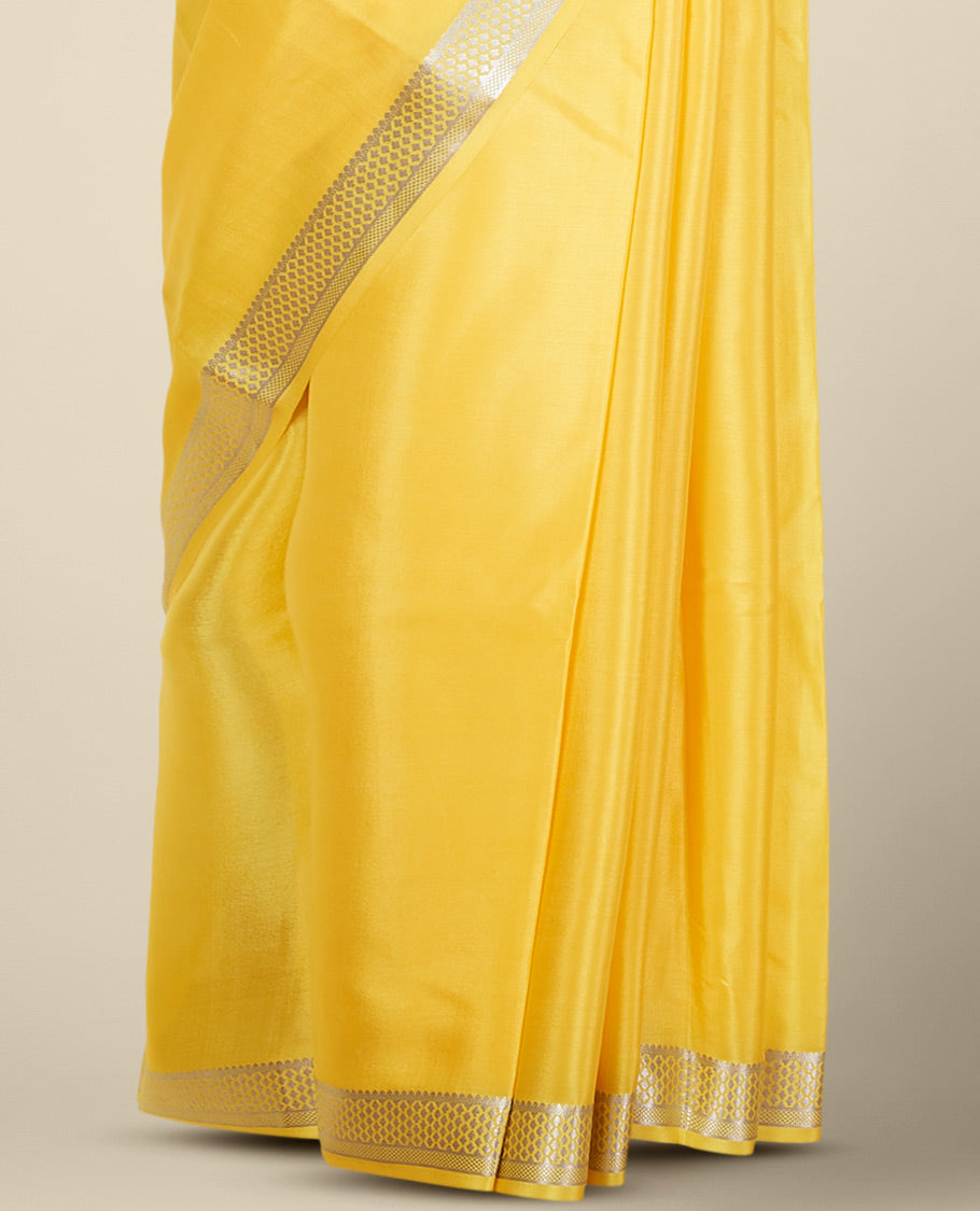 Yellow mysore silk saree with self checked zari design border