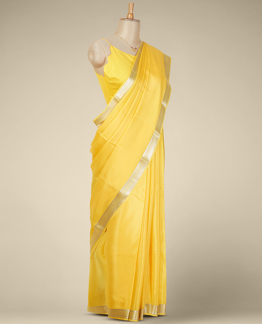 Yellow mysore silk saree with self checked zari design border