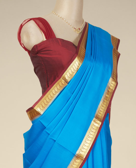 Blue mysore silk saree with contrast paisley zari design border