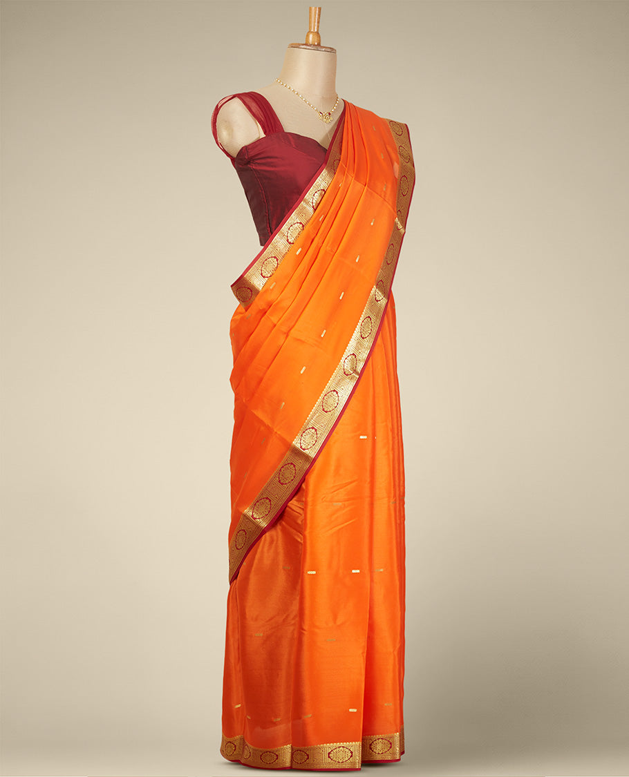 Orange buttas mysore silk saree with contrast floral design border