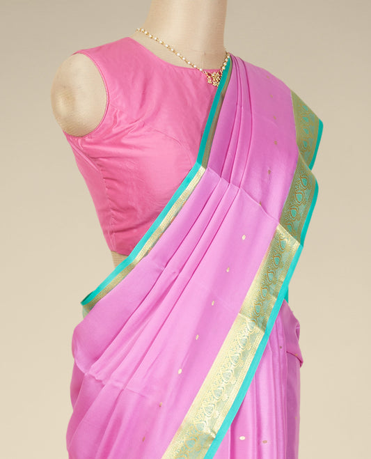 Pink buttas mysore silk saree with contrast floral zari design border