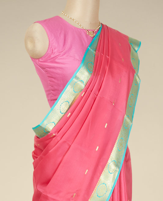 Pink buttas mysore silk saree with contrast floral zari design border