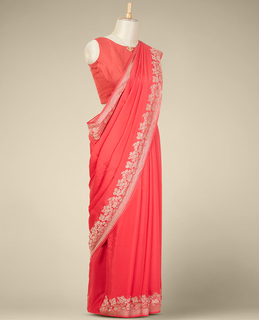 Red crepe saree with self floral design border