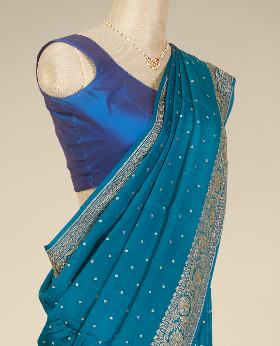 Blue floral butta crepe saree with self floral zari design border