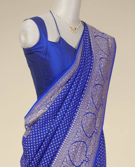 Blue floral butta banaras georgette saree with self floral design border