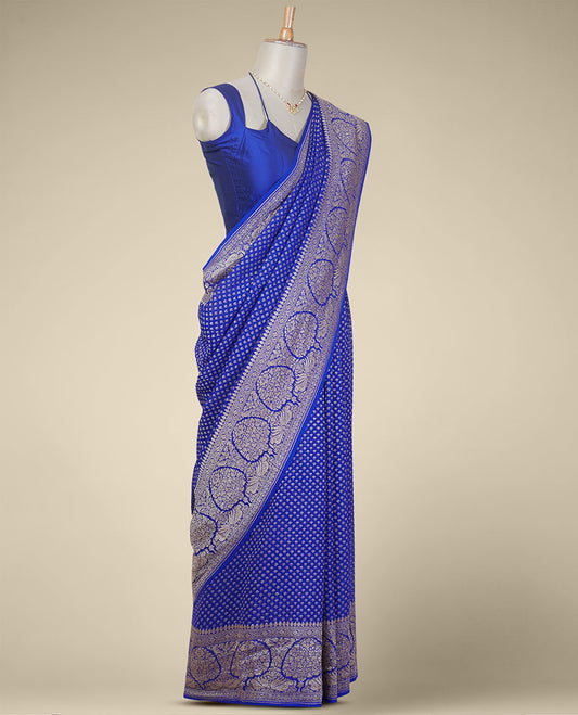 Blue floral butta banaras georgette saree with self floral design border