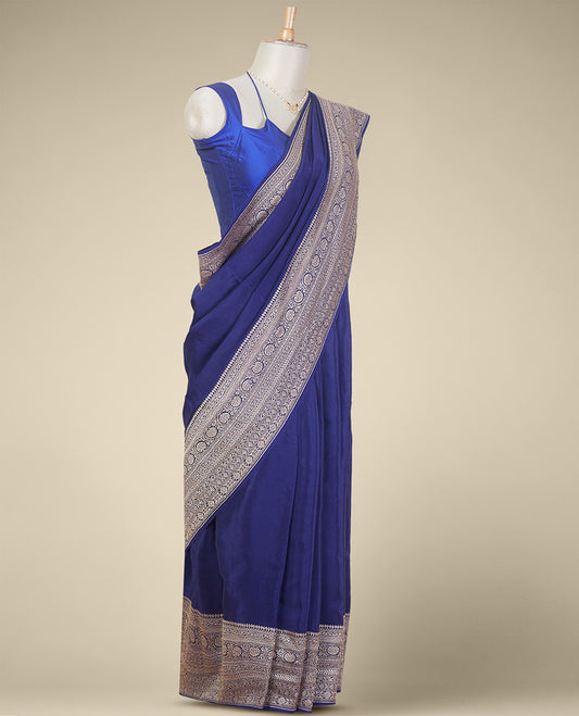 Blue floral butta banaras georgette saree with self floral design border