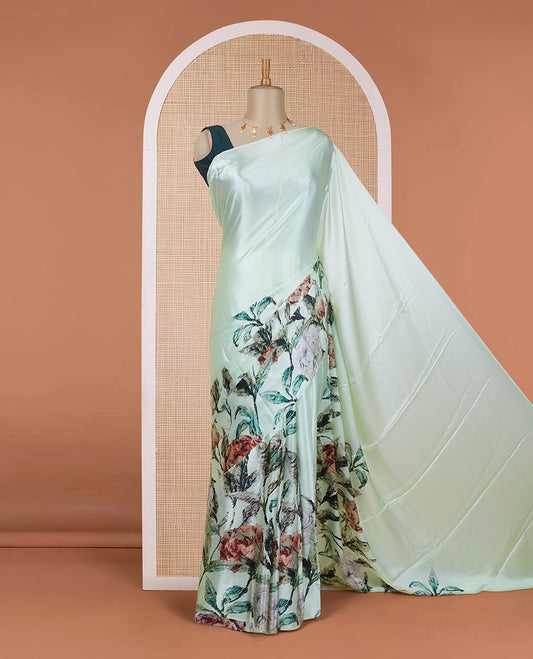 Borderless pistachio green tropical floral-theme digital printed pure satin silk saree, negative-style floral printed blouse