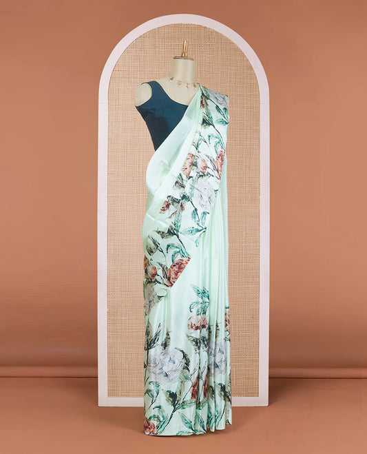 Borderless pistachio green tropical floral-theme digital printed pure satin silk saree, negative-style floral printed blouse