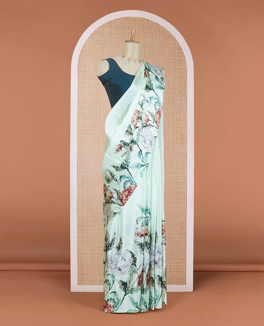 Borderless pistachio green tropical floral-theme digital printed pure satin silk saree, negative-style floral printed blouse
