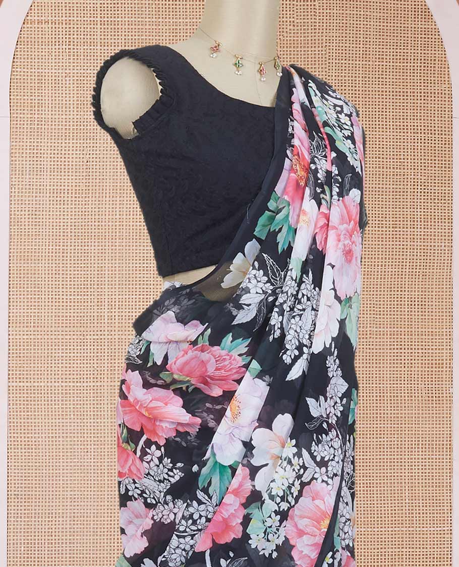 Borderless black digital printed pure chiffon saree with pink colored floral motifs, floral printed blouse