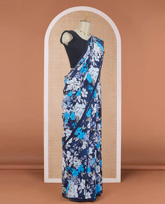 Borderless blue all-over floral motifs digitally printed pure crepe saree, floral printed matching blouse