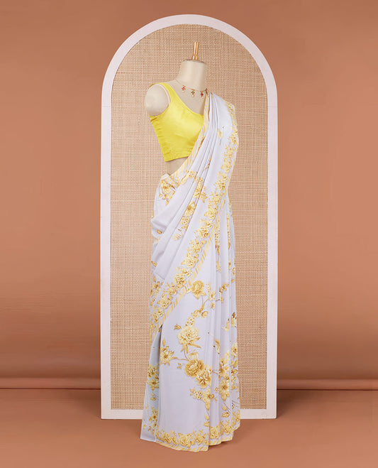Grey digitally printed pure crepe saree with yellow floral & bird motifs & slanting stripes printed border