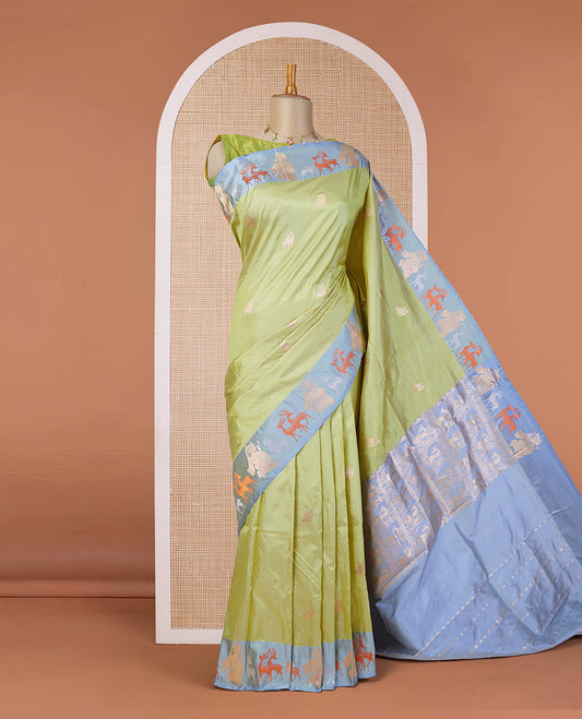 Green katan silk saree with deer motifs, contrast border of deer & human motifs & pallu with deer motif enclosed checks
