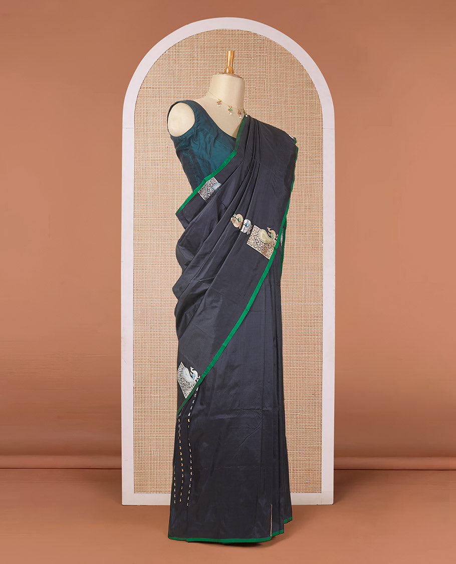 Borderless black katan silk saree with peacock motifs, self-pallu steeped with meenakari peacock motifs