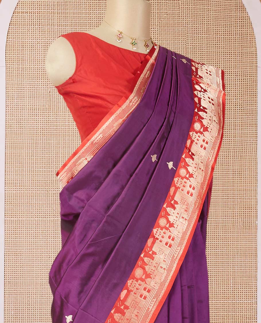 Purple katan silk saree with zari buttas, contrast border & zari-rich pallu adorned with Mughal-theme buildings