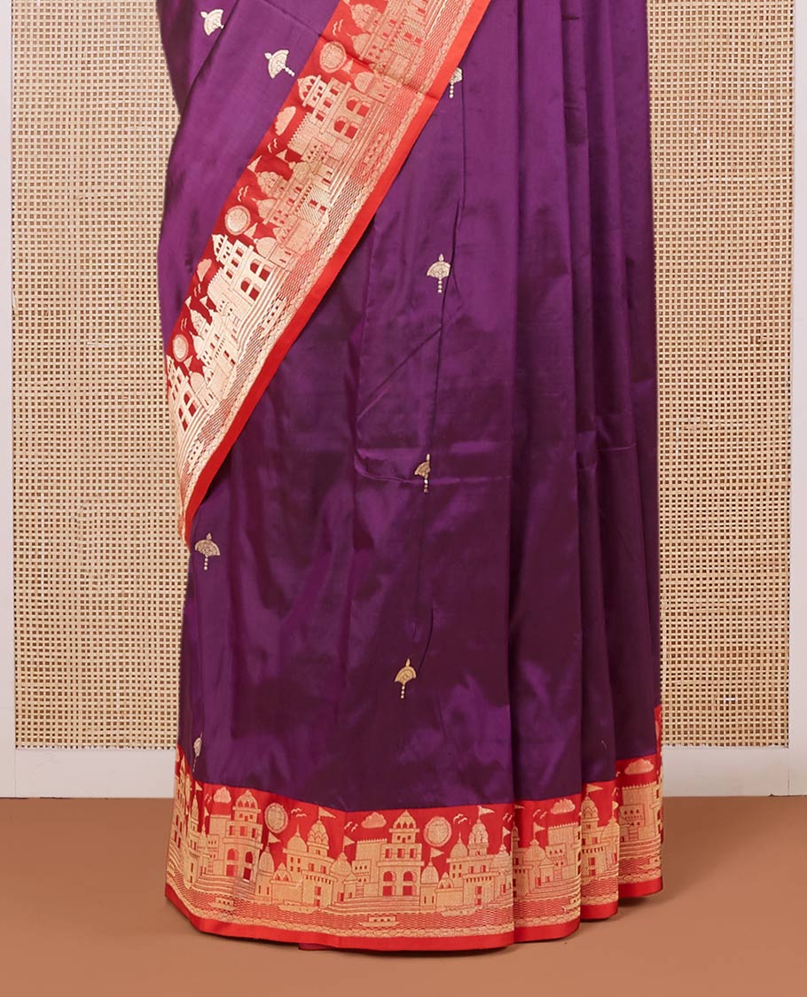 Purple katan silk saree with zari buttas, contrast border & zari-rich pallu adorned with Mughal-theme buildings