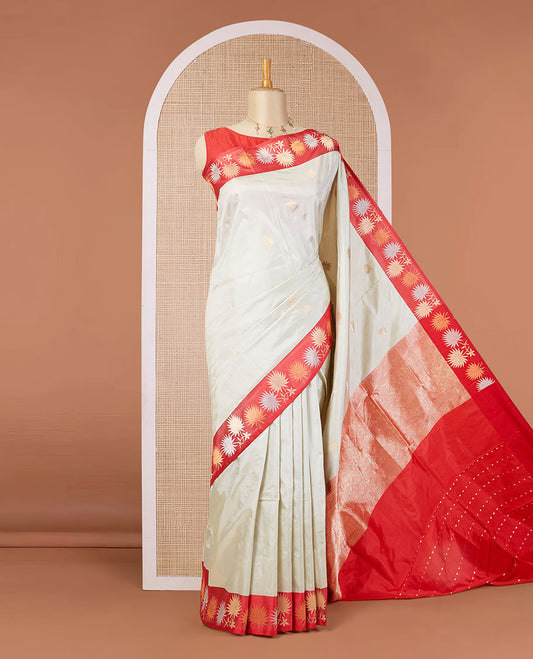 Half-white zari buttas katan silk saree, contrast floral design zari border & geometric patterned pallu