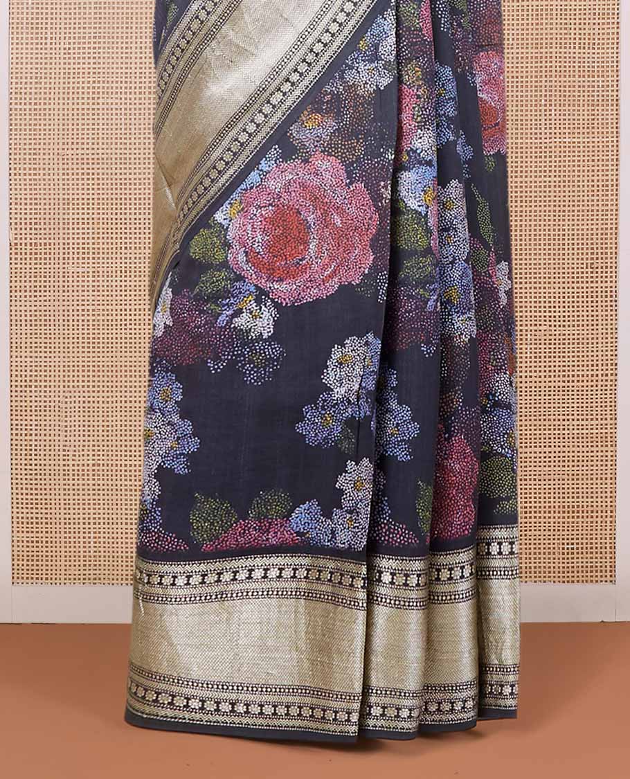Black printed chiniya silk saree with colorful floral motifs, traditional zari design border