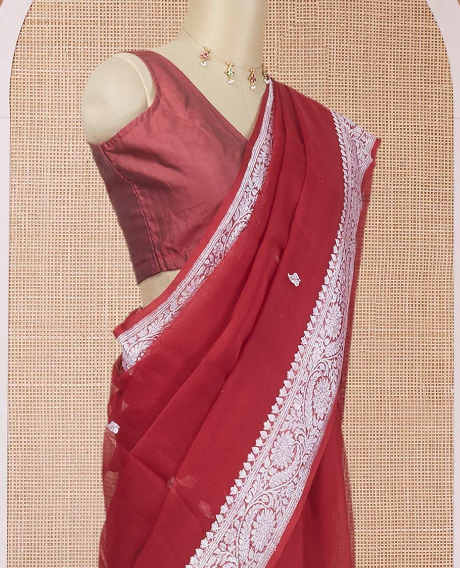 Maroon banarasi georgette saree with zari buttas, floral creeper zari border & pallu of paisleys