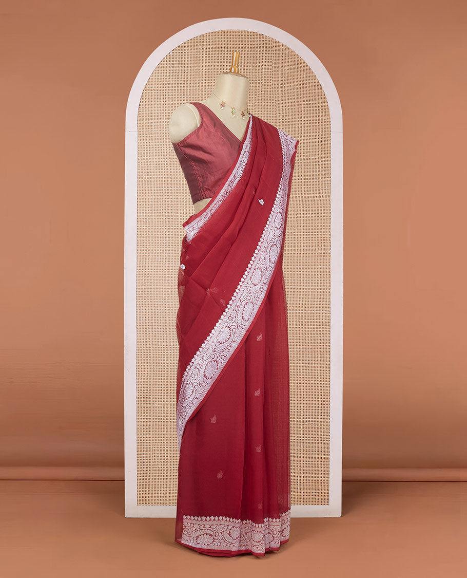 Maroon banarasi georgette saree with zari buttas, floral creeper zari border & pallu of paisleys
