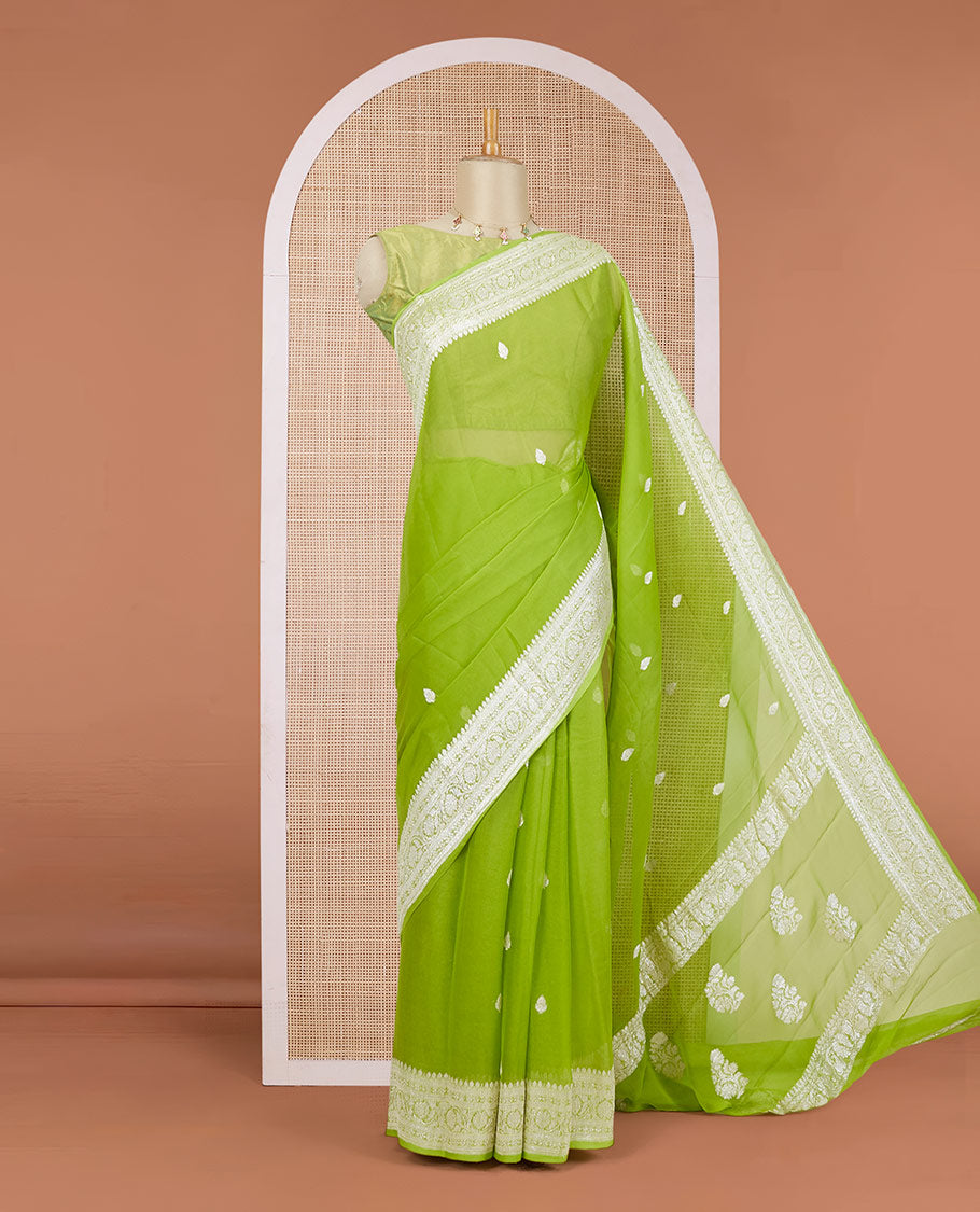 Green banaras georgette saree with zari buttas, traditional zari border of floral creeper design & floral design pallu